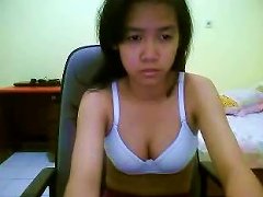 Petite Asian Girl Takes Off Her Bra But Still Hides Her Titties Porn Videos
